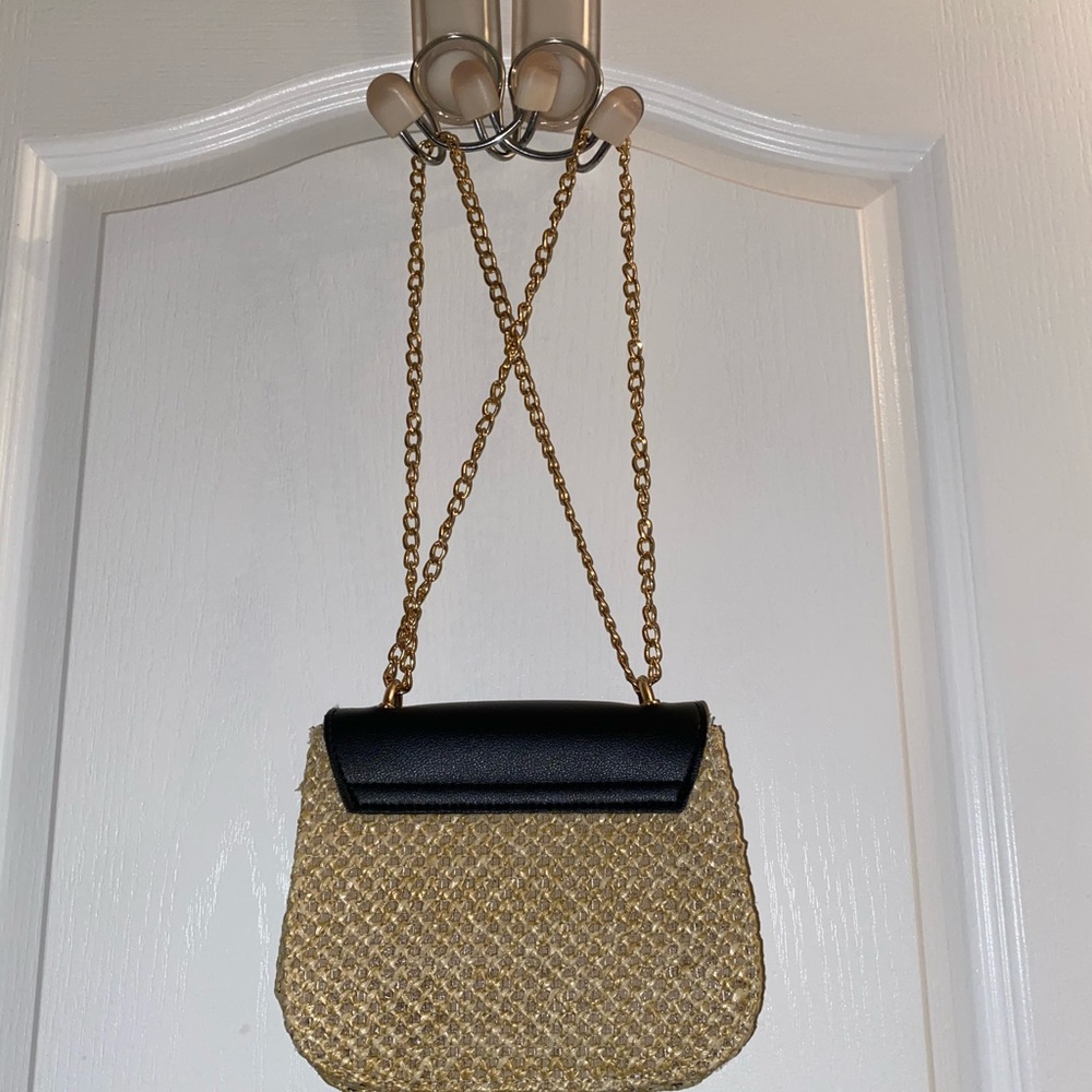 Black and straw handbag